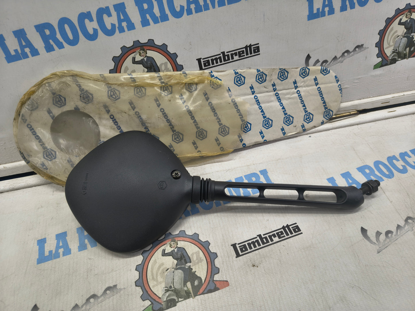 Specchio sinistro Originale PIAGGIO SI FL / GRILLO / CIAO FL [GRIGIO]