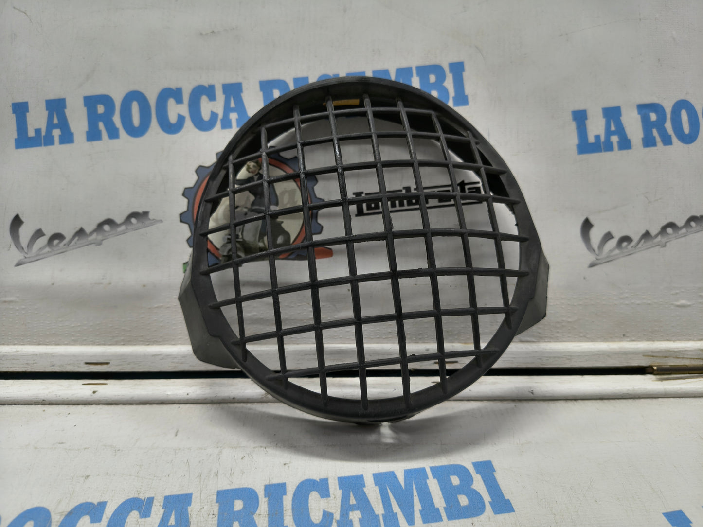Griglia protezione faro parasassi Vespa PX 125 / 150 / 200