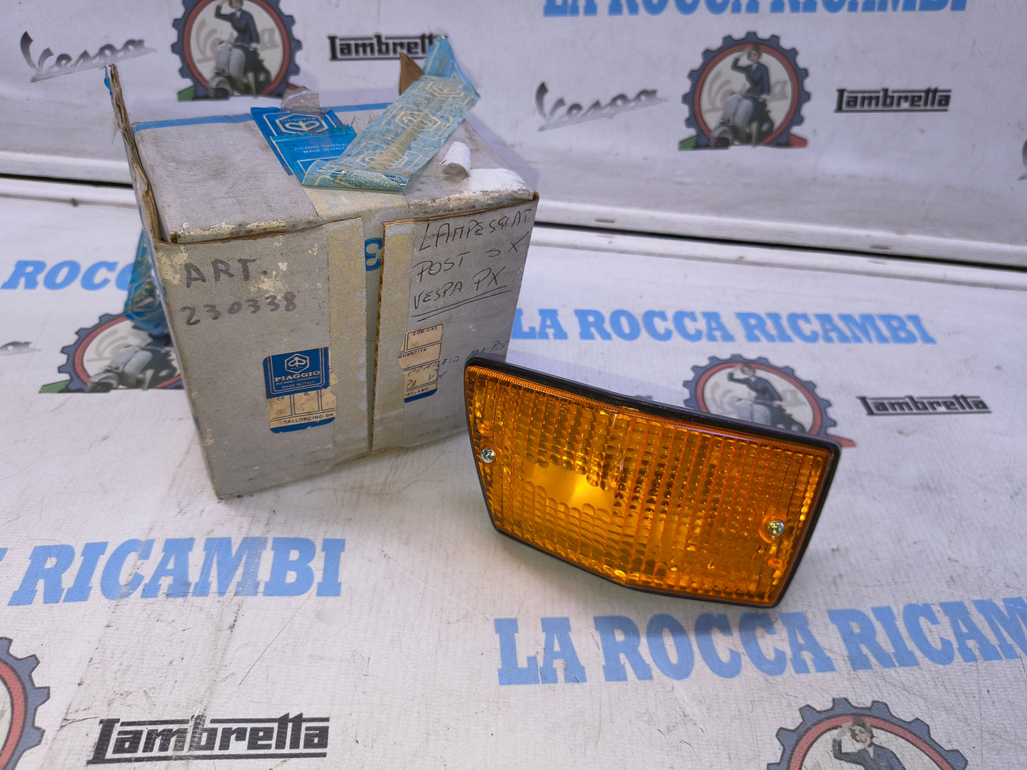 FRECCIA LAMPEGGIATORE POSTERIORE SINISTRO VESPA PX 125 200 T5 ORIGINALE 230338