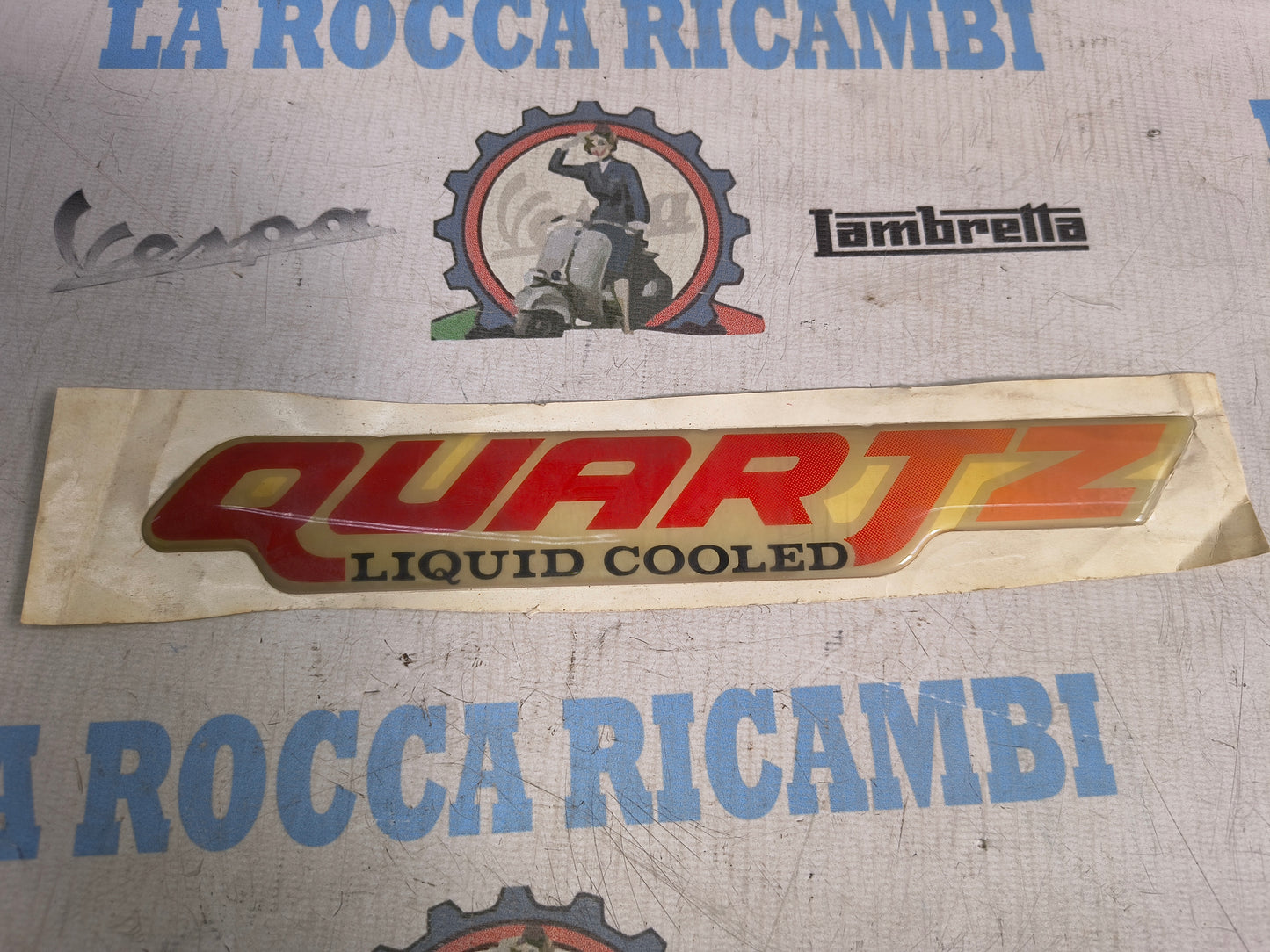 TARGHETTA LATERALE ORIGINALE PIAGGIO QUARTZ 259555