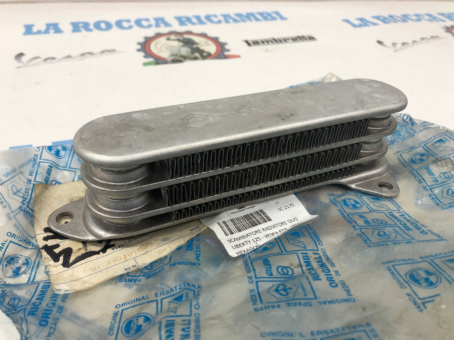 SCAMBIATORE RADIATORE OLIO LIBERTY 125 - VESPA ET4 - SFERA - HEXAGON 435590