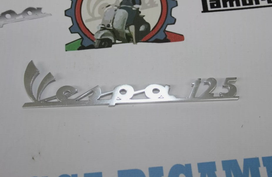 Scritta Anteriore "VESPA 125" Vespa Primavera Serie 1